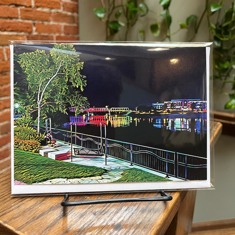 Maureen McRaith Greeting Card - Downtown River Bench Night