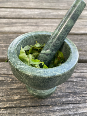 Making Pesto in mortar and pestle