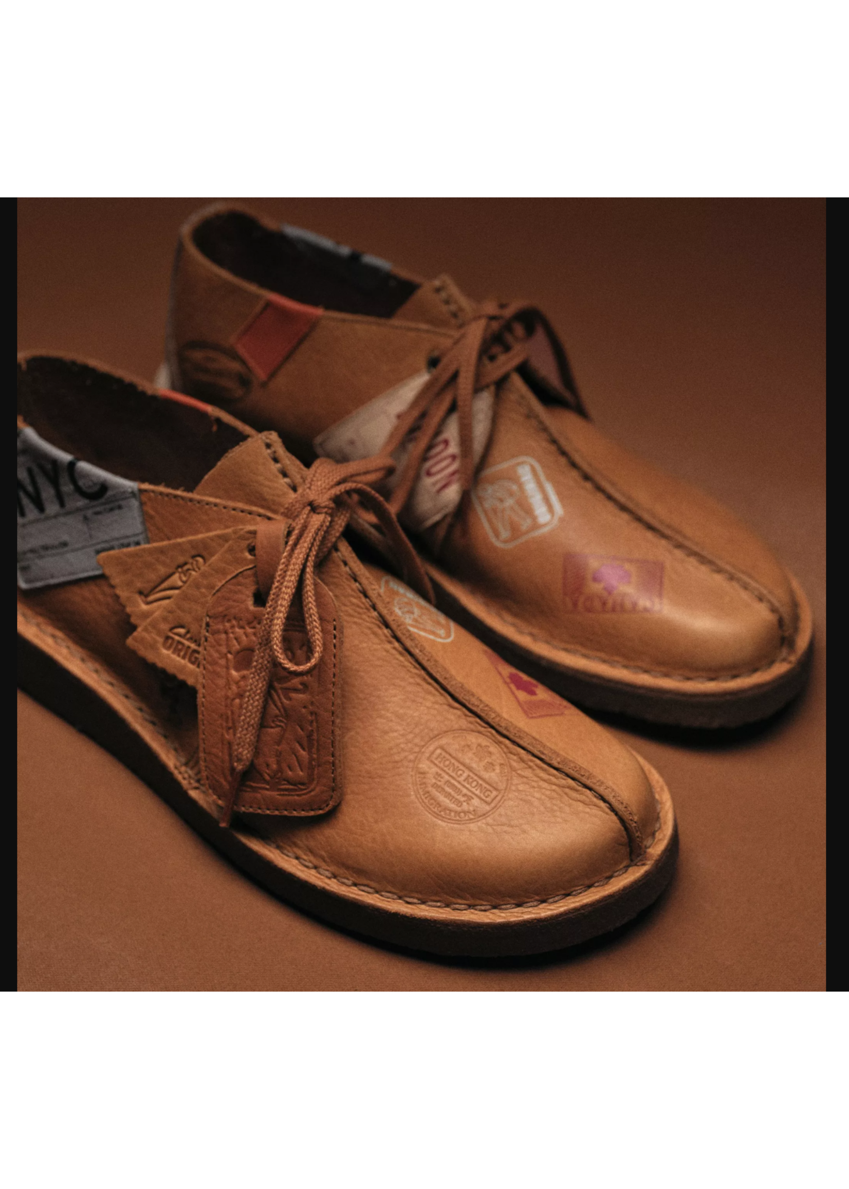 Clarks Mens Desert Travel Trek – Tan Brown Leather with Travel Stickers, Natural Crepe Sole, (26183897)
