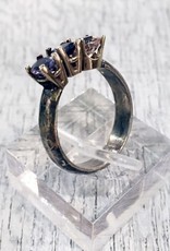 Chris Gillrie Aphrodite Ring. Solid silver band. White Gold Settings with Lolite, Amethyst and Pink Cubic Zirconia stones. Size 8.5
