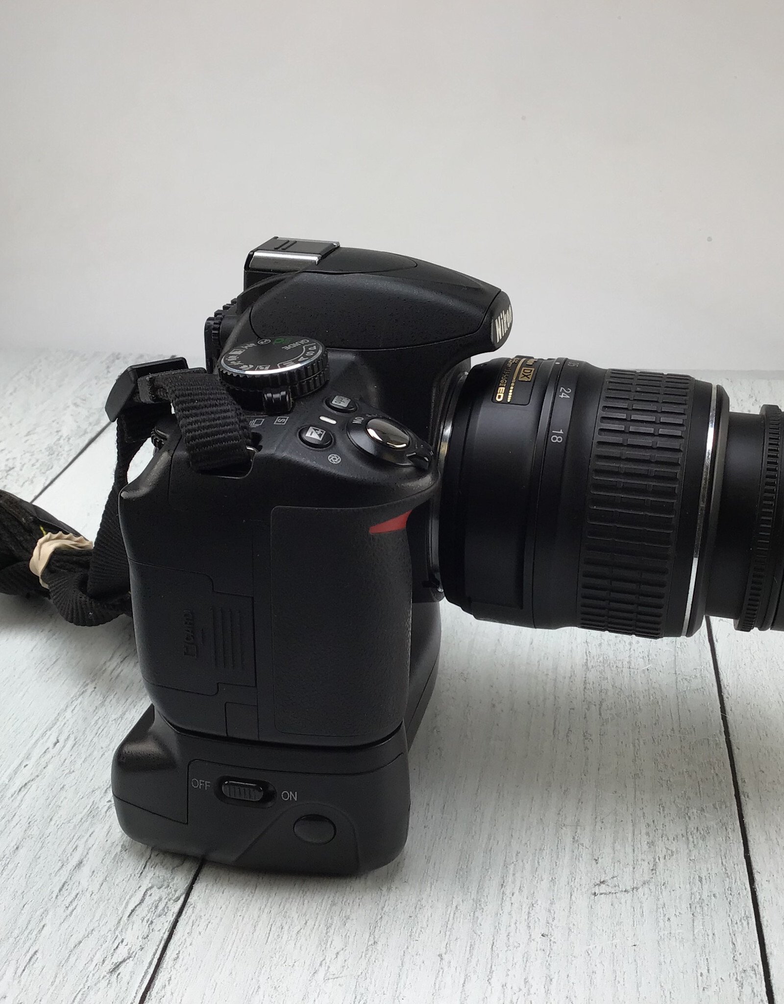 NIKON Nikon D3100 Camera w/ 18-55mm, Digipower Grip Used Fair