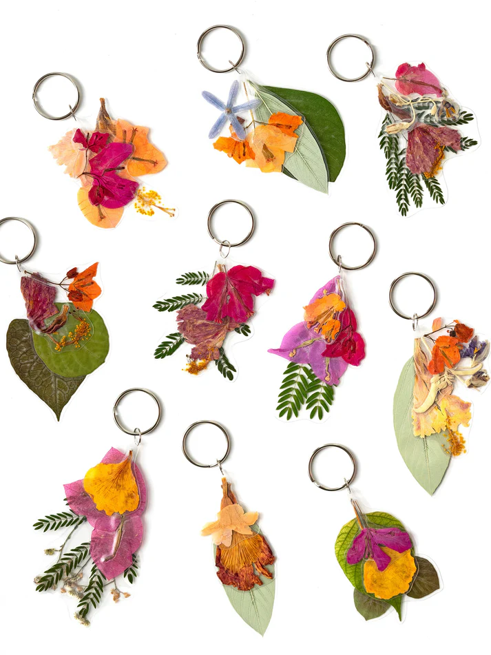 Pupa by Gio Keychain Florece