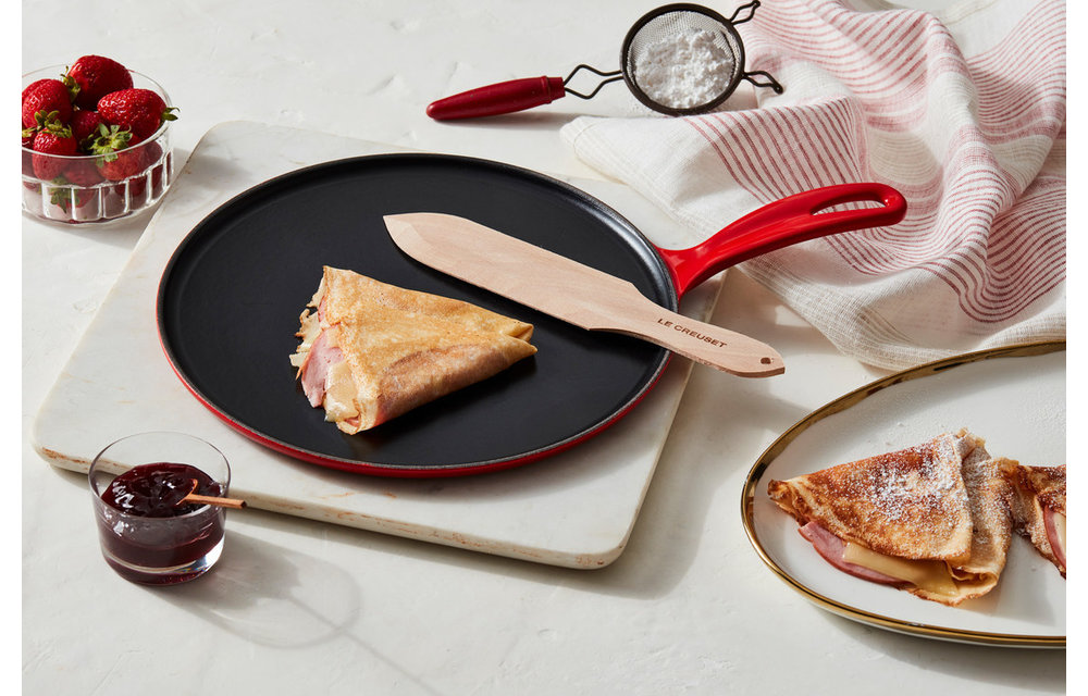 https://cdn.shoplightspeed.com/shops/634646/files/53806360/1000x640x2/le-creuset-traditonal-cast-iron-crepe-1066-cerise.jpg