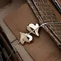 MEGA ART HEART BUTTON EARRING
