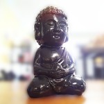 Medatating Buddha With Egg