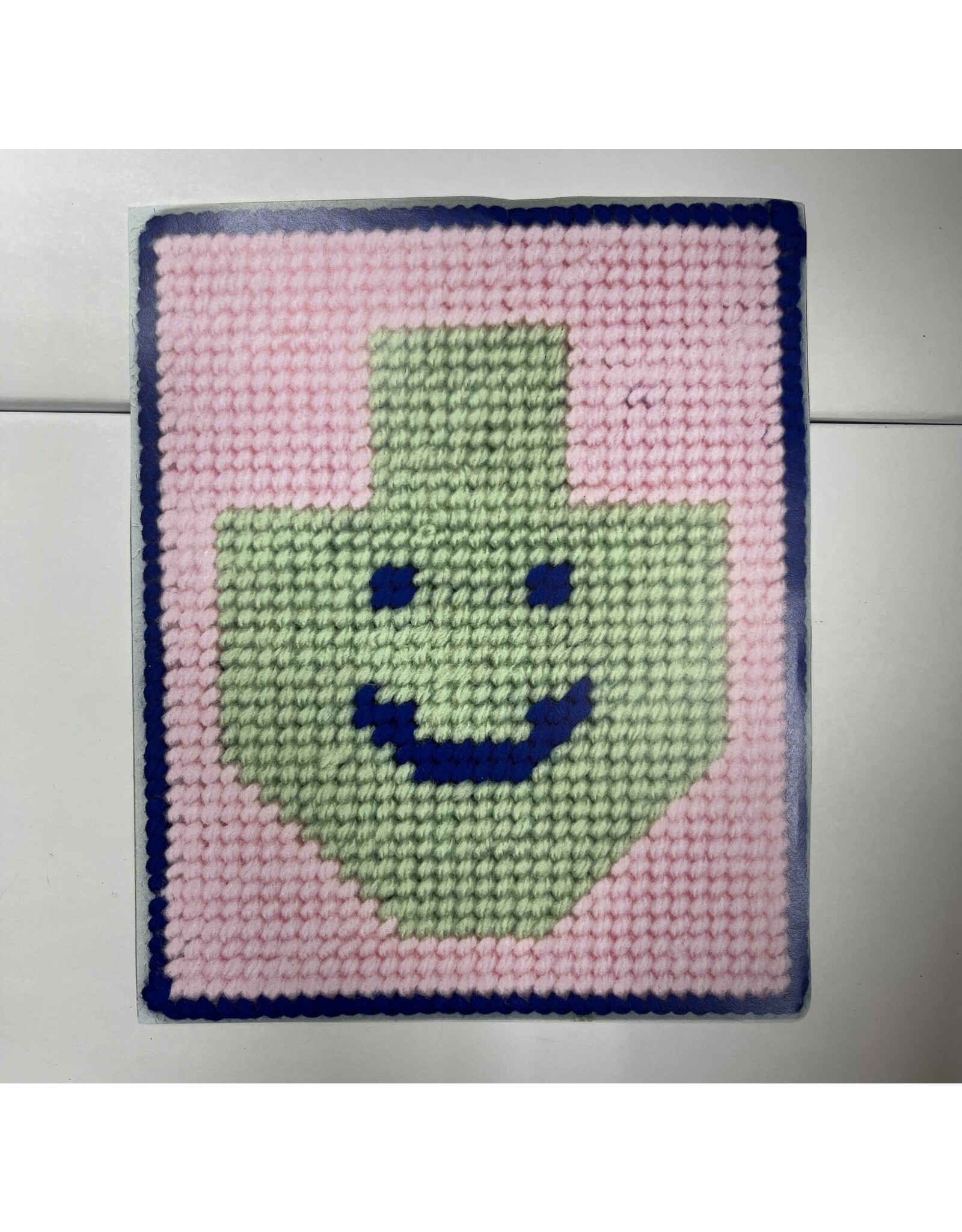 NEEDLE-POINT: DREIDEL