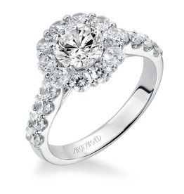 Art Carved Diamond engagement ring with center stone surrounded by round diamonds and a diamond enhanced band