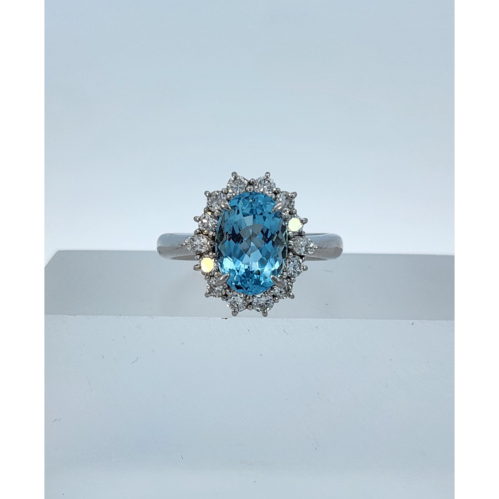 Platinum Aquamarine & Halo Diamond Ring