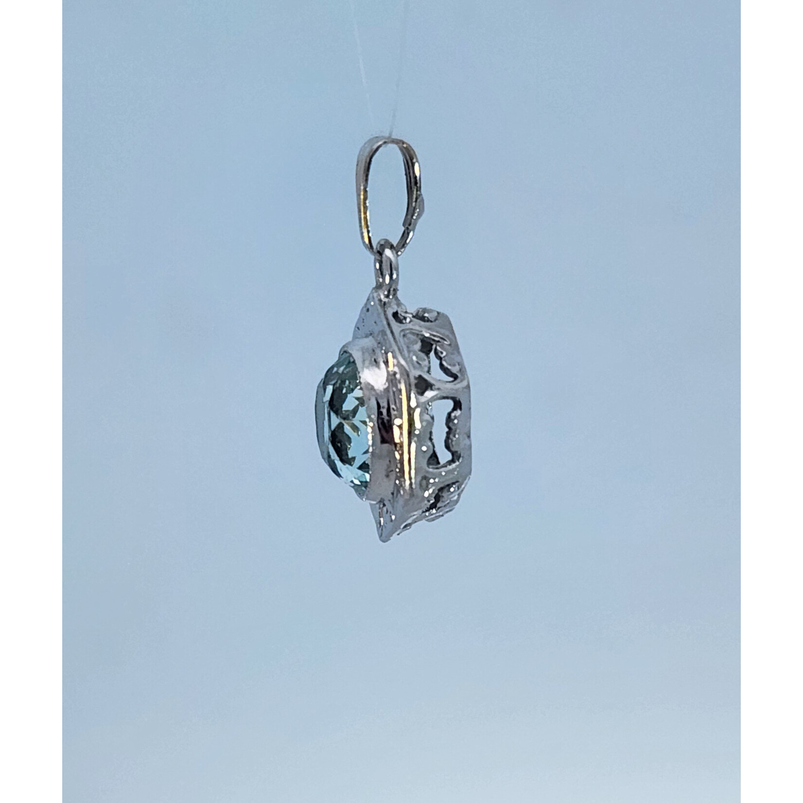 14 Karat White Gold Imitation Aquamarine Scroll Pendant