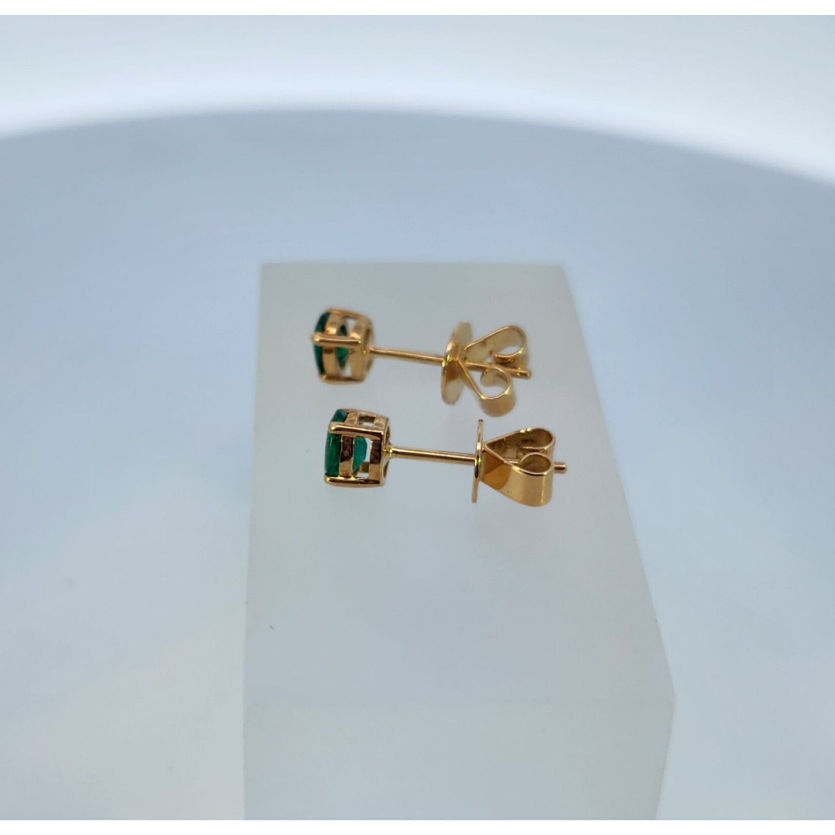18 Karat Yellow Gold Emerald Prong set Oval  studs