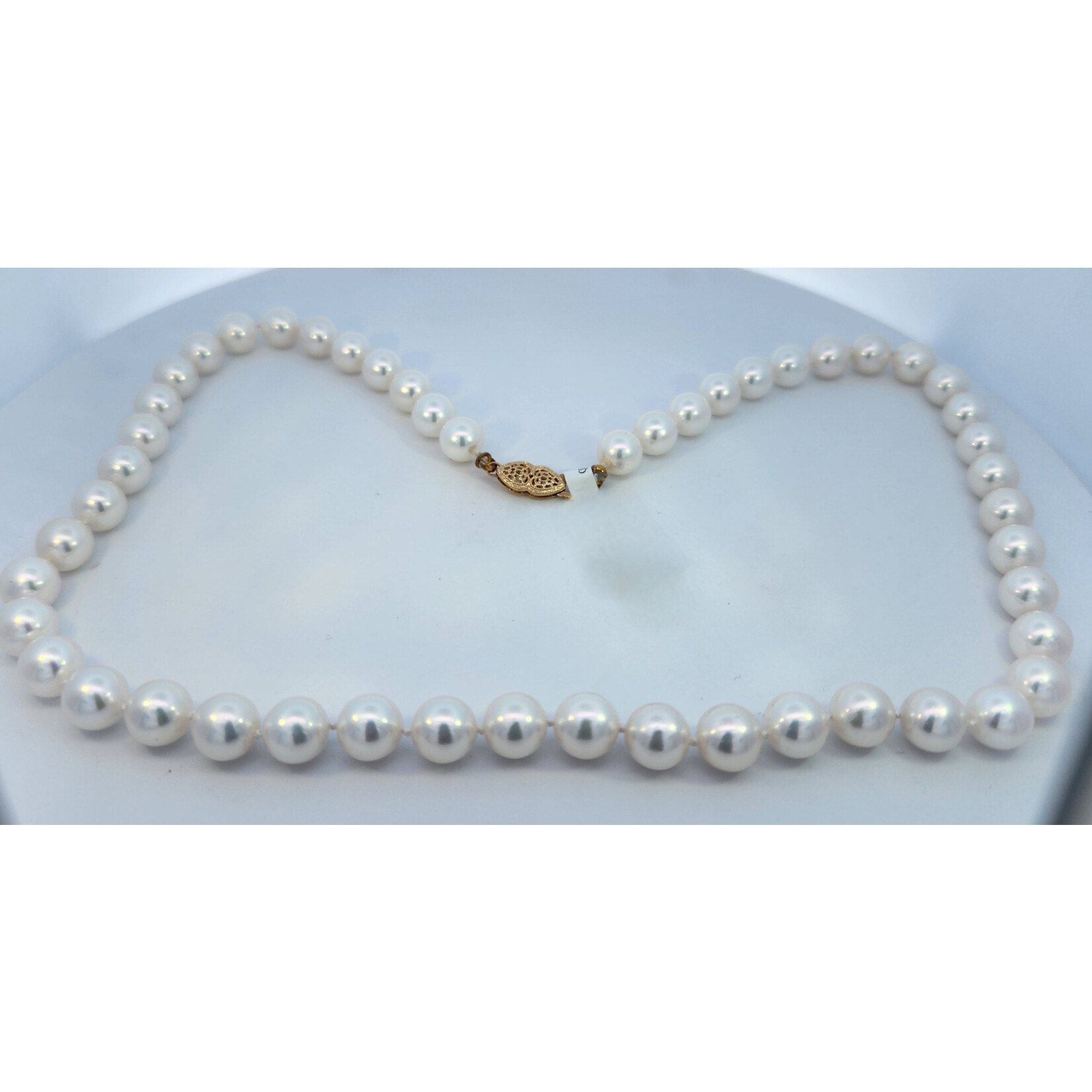 18" White Pearl 8 mm Necklace with 14 Karat Yellow Gold clasp.
