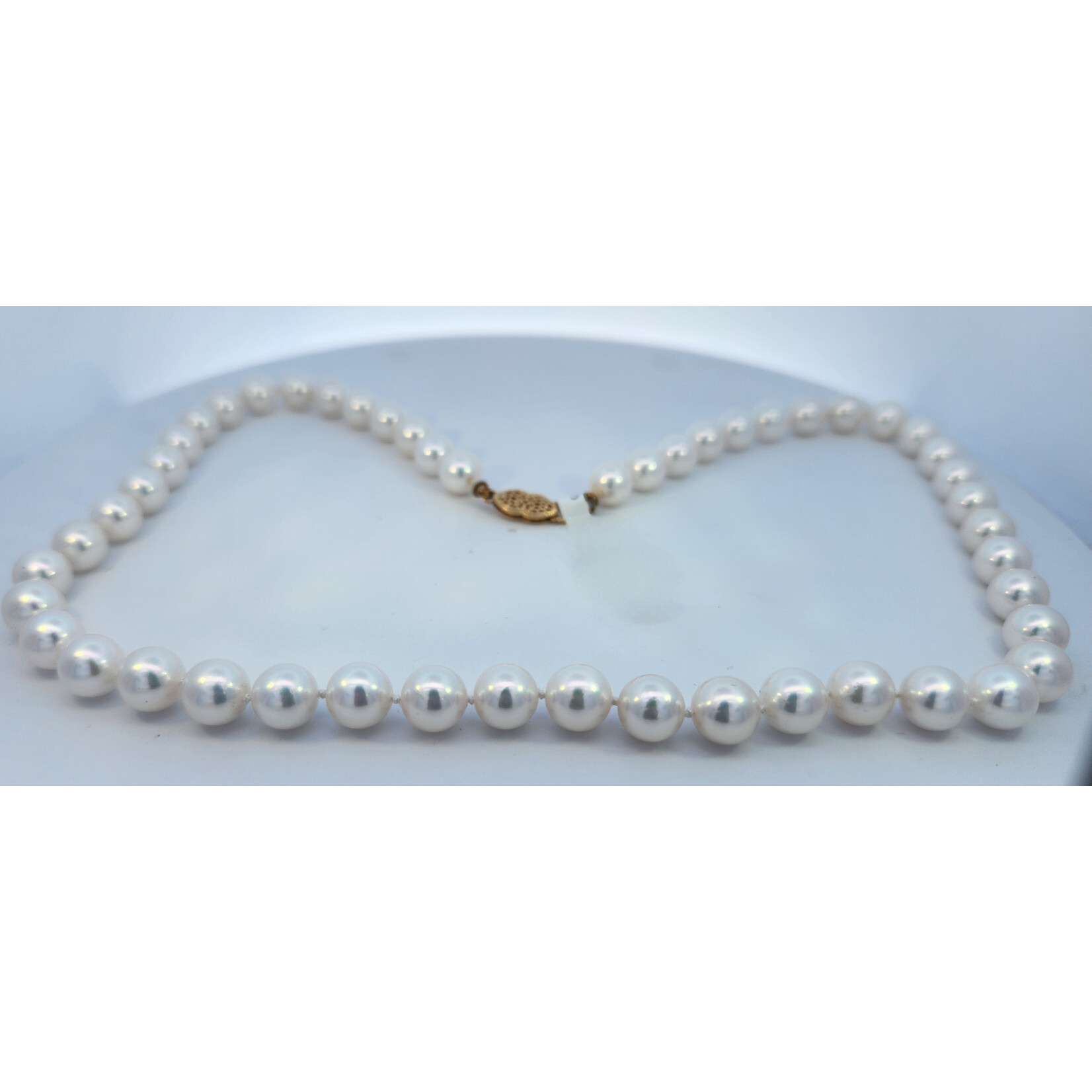 18" White Pearl 8 mm Necklace with 14 Karat Yellow Gold clasp.