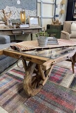 Vintage Dutch  Wheelbarrow Cart with Modern Glass Top installed to create a Coffee Table