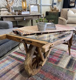 Vintage Dutch  Wheelbarrow Cart with Modern Glass Top installed to create a Coffee Table