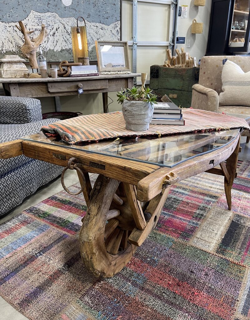 Vintage Dutch  Wheelbarrow Cart with Modern Glass Top installed to create a Coffee Table