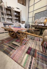 Vintage Dutch  Wheelbarrow Cart with Modern Glass Top installed to create a Coffee Table