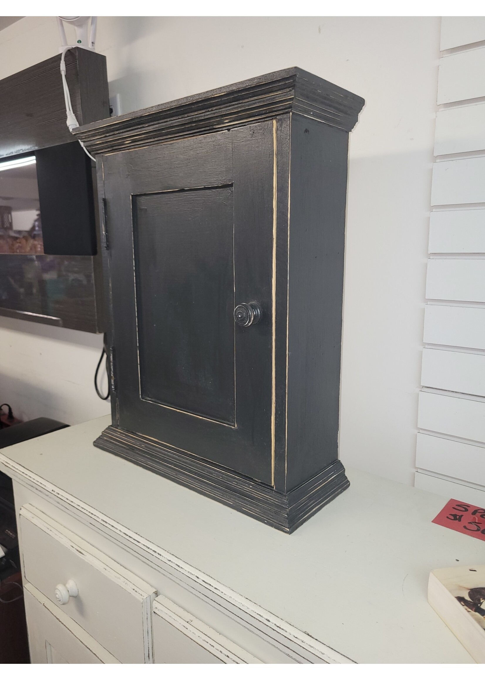 Pharmacie  noire en bois 24 h x 19 l x 7 p