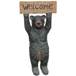 Bear Holding welcome sign