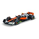 BBurago . BUR 1/43 McLaren Racing MCL60 (2023) w/ driver (Norris #4)