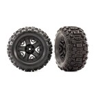 Traxxas . TRA Tires & wheels, assembled, glued (2.8") (Hoss 4X4 black wheels, Sledgehammer tires, foam inserts) (2) (TSM rated)