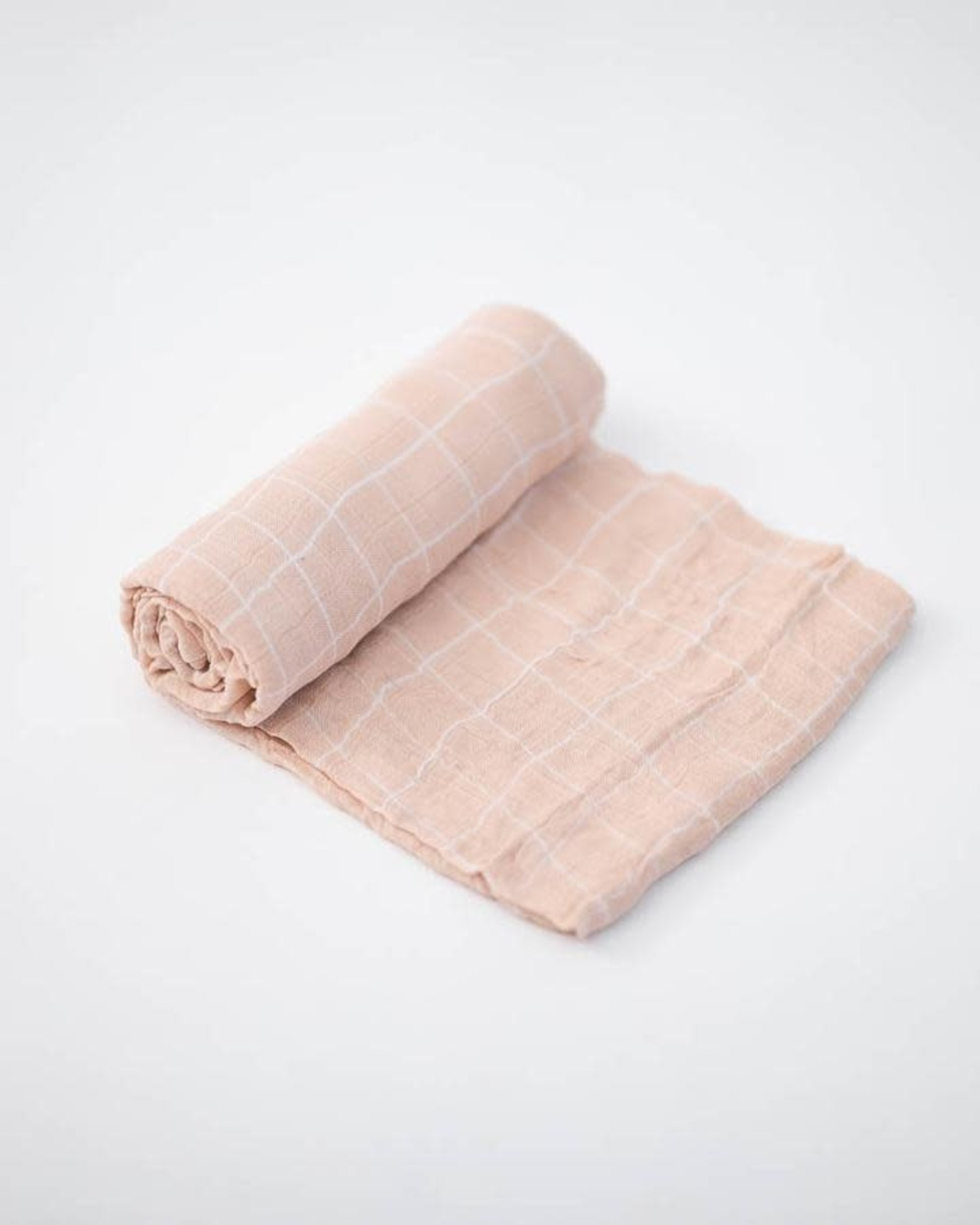 pink muslin swaddle