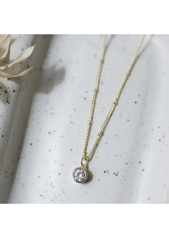 Glee Jewelry Luster Necklace by Glee | Clear crystal in Gold