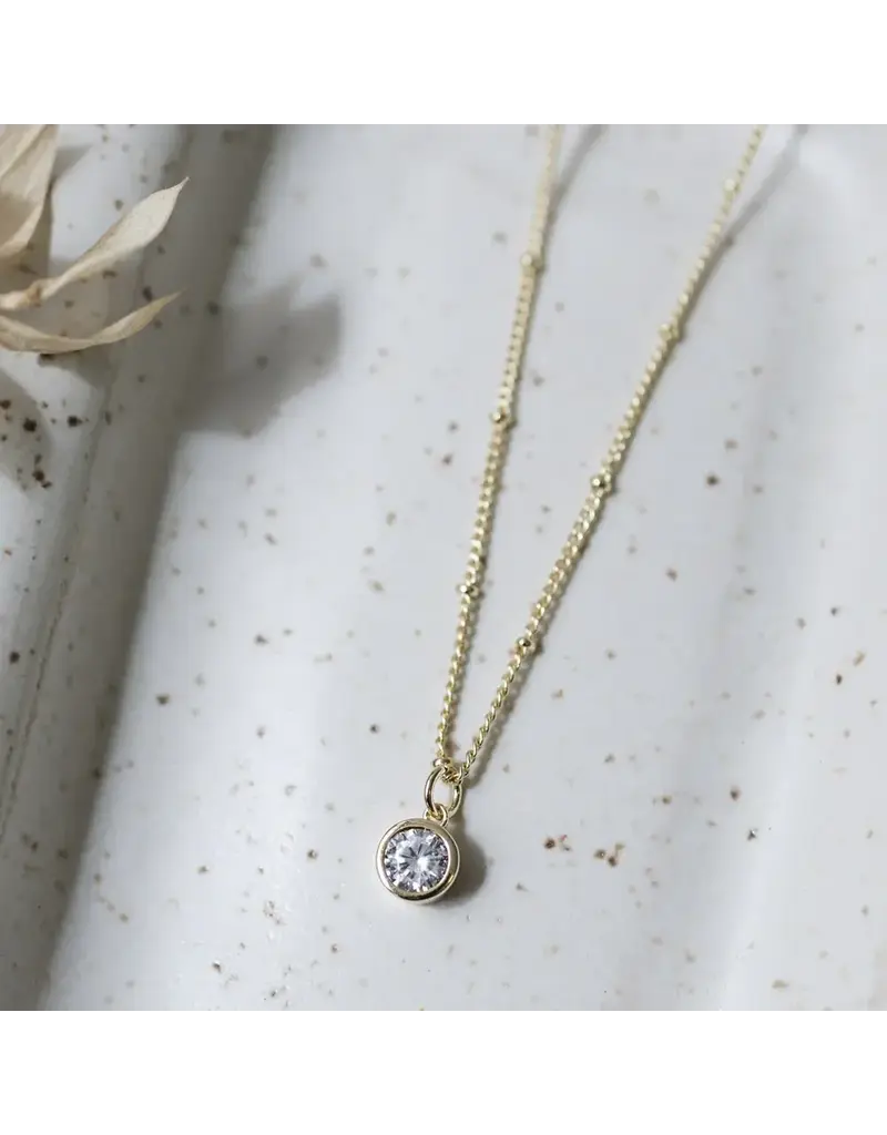 Glee Jewelry Luster Necklace by Glee | Clear crystal in Gold