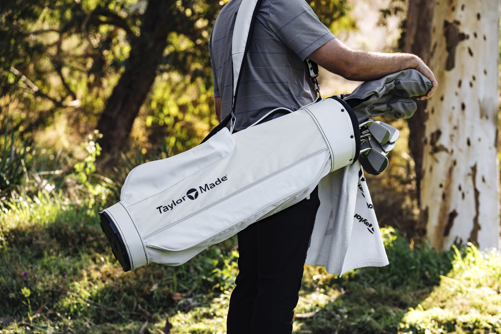 Carry bags designed for lightweight portability, featuring comfortable straps and essential pockets for easy access to golf clubs and accessories while walking the course.