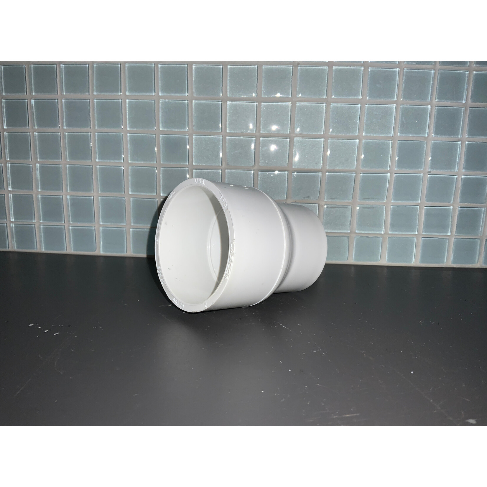 PVC REDUCING COUPLER 2"x1-1/2"
