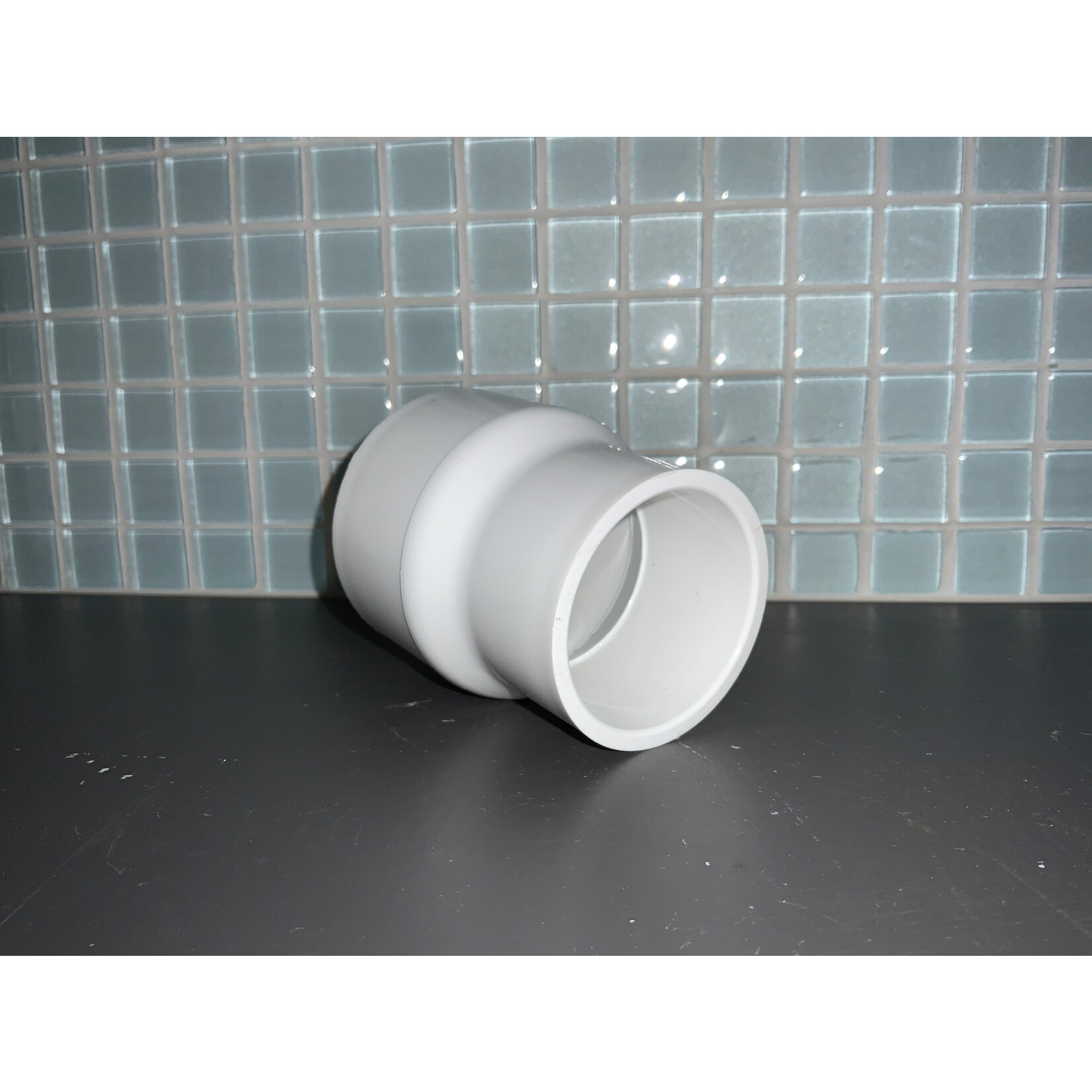PVC REDUCING COUPLER 2"x1-1/2"
