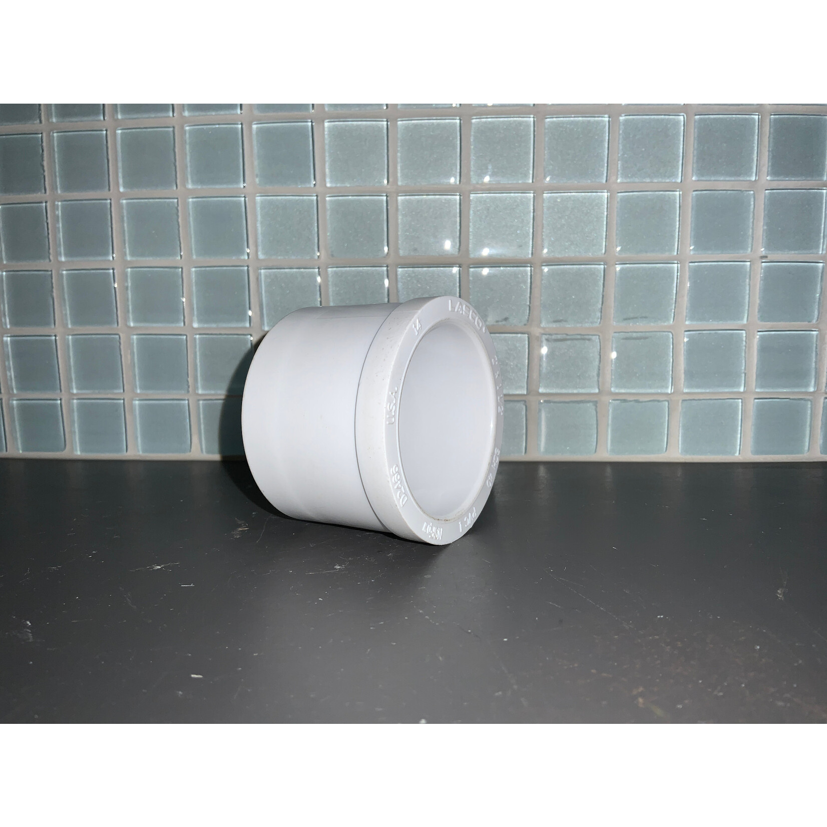 PVC BUSHING 2'' X 1 - 1/2 GLUE