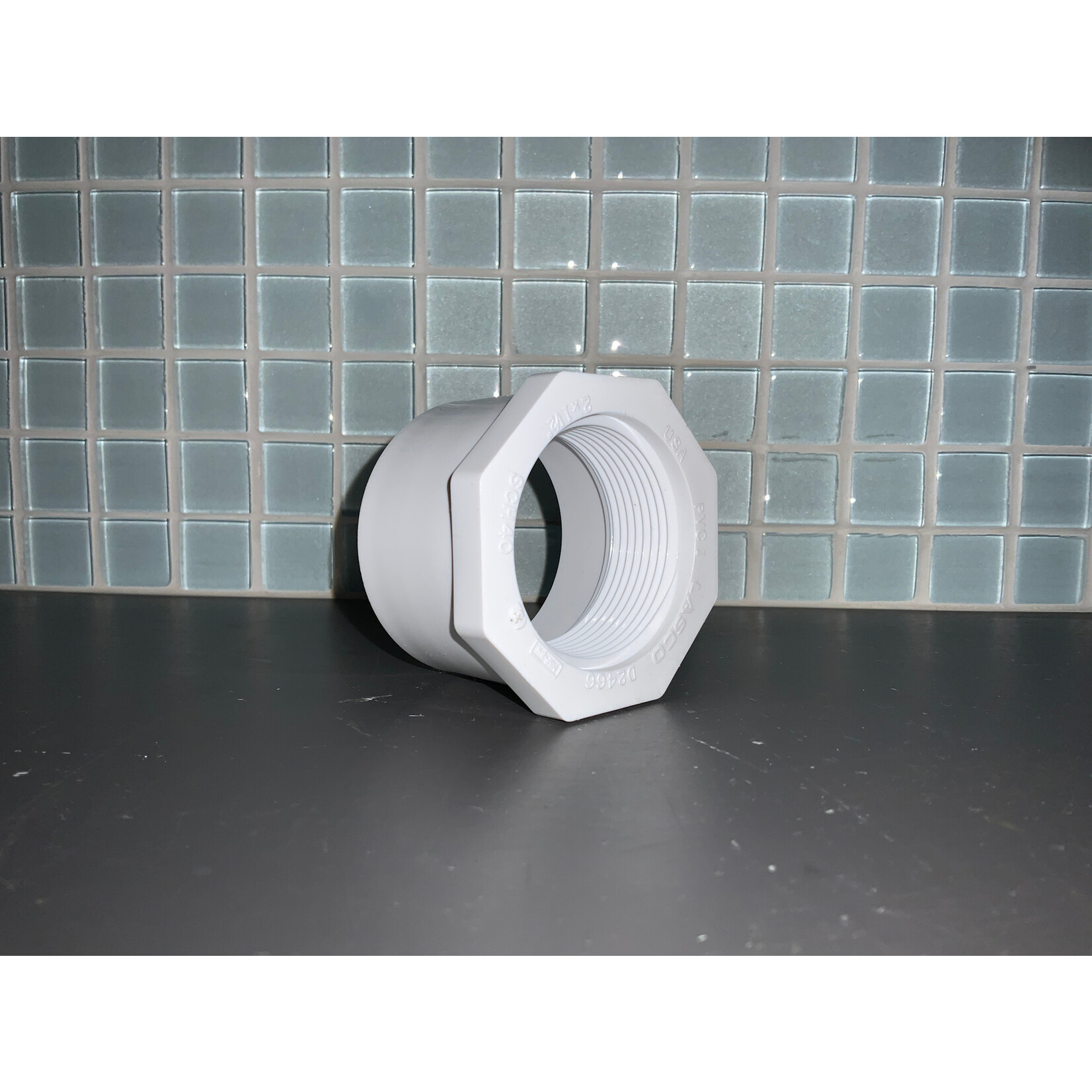 PVC BUSHING 2" x 1-1/2" FxS