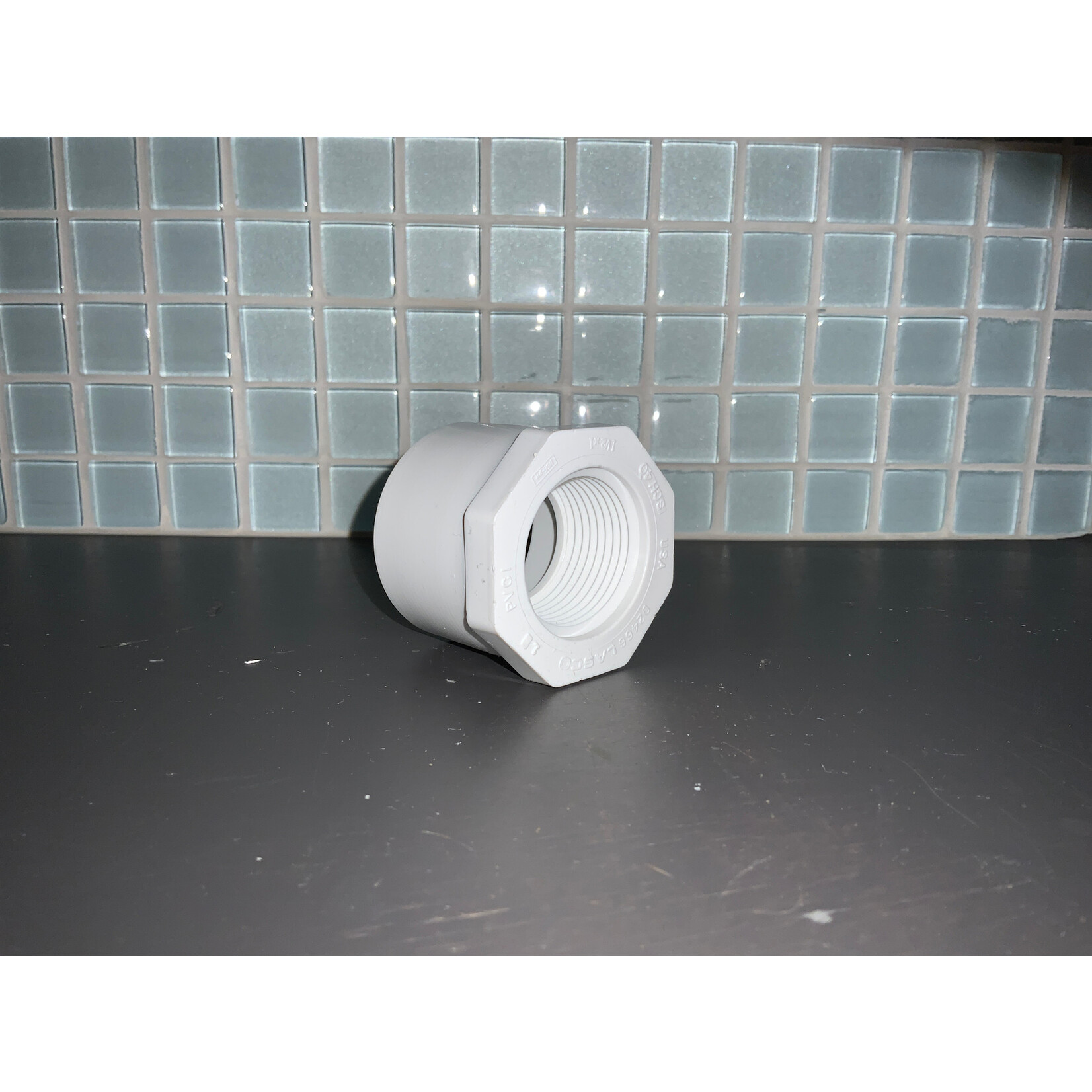 PVC BUSHING 1-1/2"x 1"