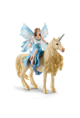 Schleich Eyela Riding a Golden Unicorn