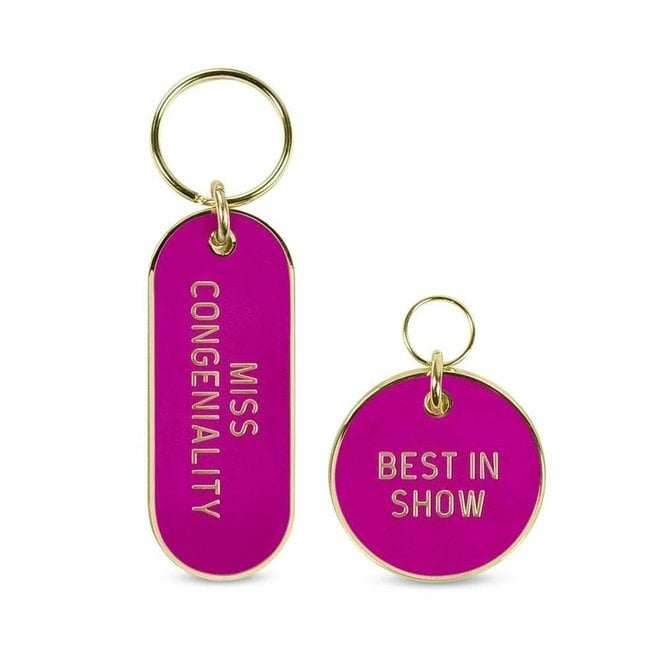 https://cdn.shoplightspeed.com/shops/635126/files/29879206/660x660x2/fred-friends-best-in-show-keychain-pet-tag-set.jpg