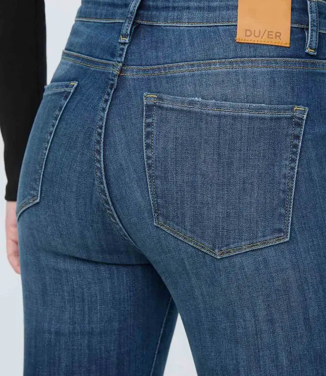 Du/er Performance High Rise Flare, Worn in Blue
