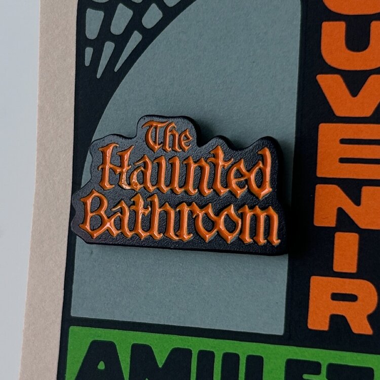 Wonder Fair Haunted Bathroom Gooey Logo Enamel Pin
