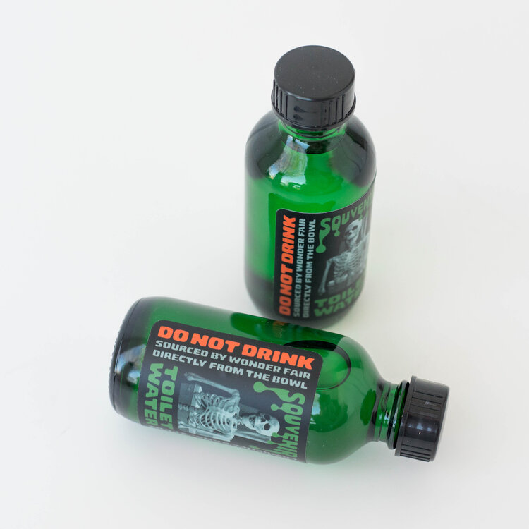 Wonder Fair Haunted Bathroom Souvenir Toilet Water - Amber Bottle