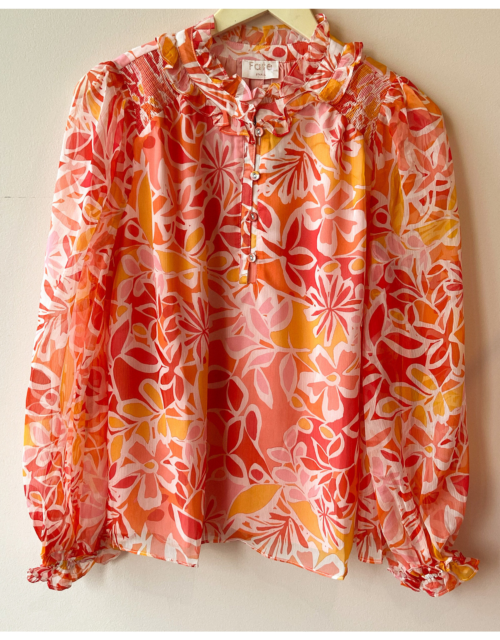 LEVI RUFFLE NK BLOUSE