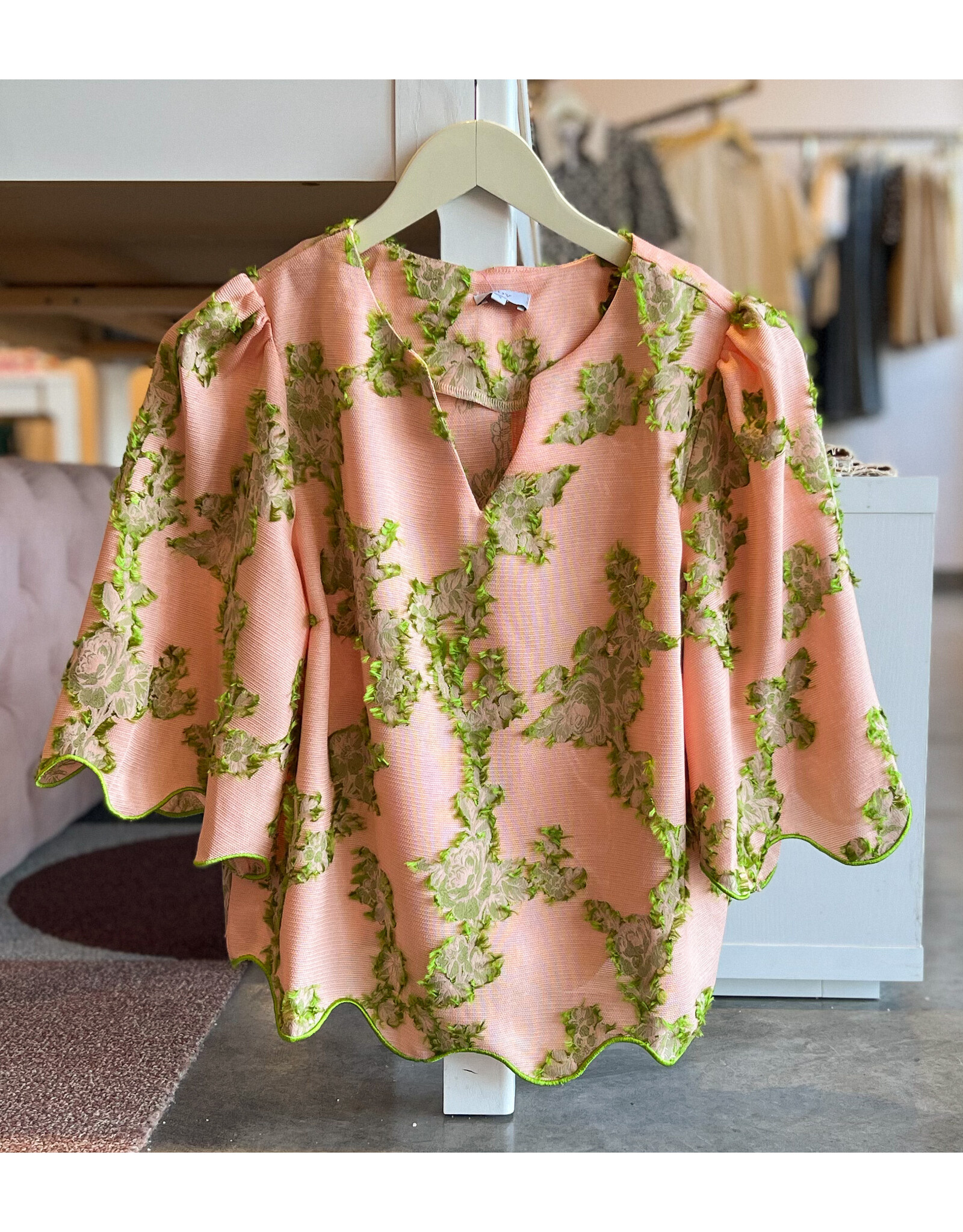 CARLYN WAVY EMBROIDERED HEM FLORAL TOP