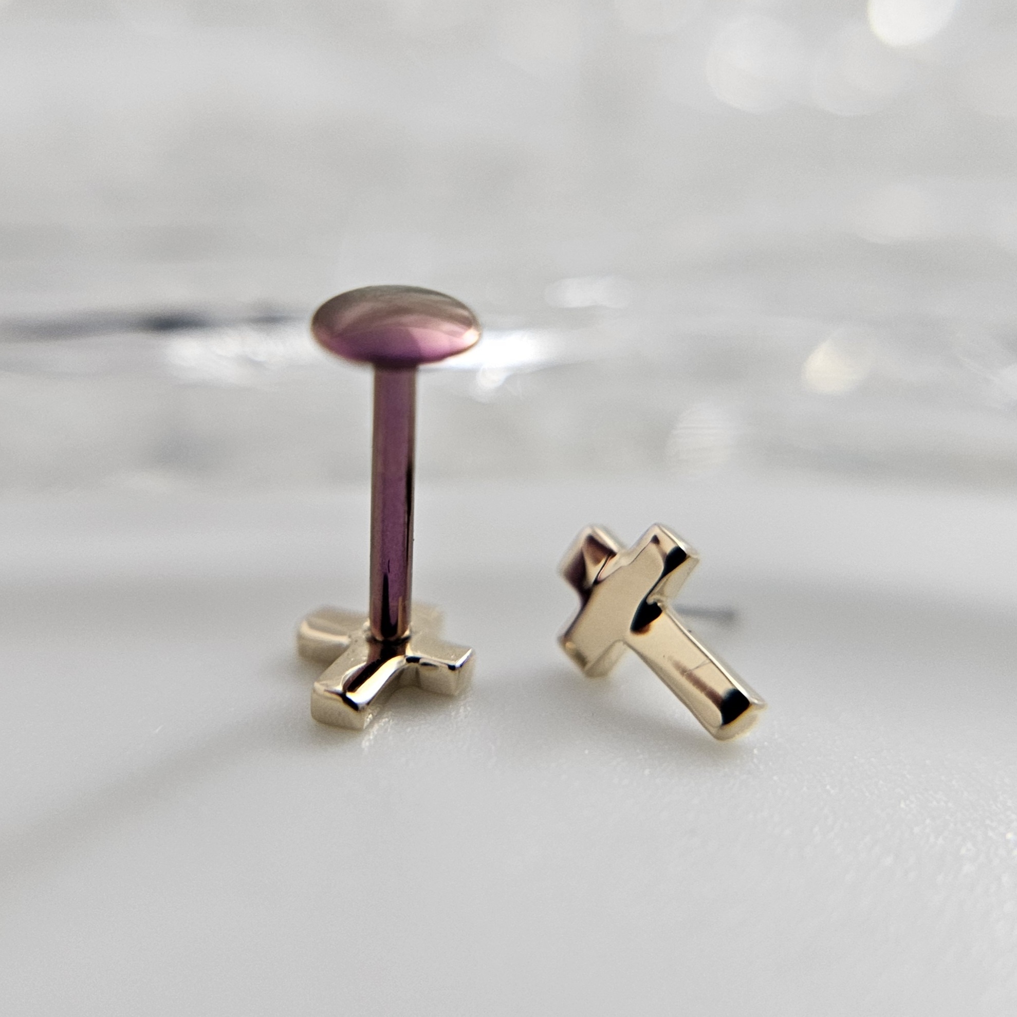 14KT Yellow Gold White CZ Cross Flat Back Labret 14KT Yellow Gold White CZ Cross Flat Back Labret