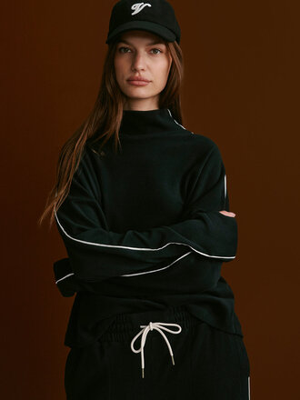 VARLEY RONA HIGH NECK MIDLAYER IN BLACK/SNOW WHITE