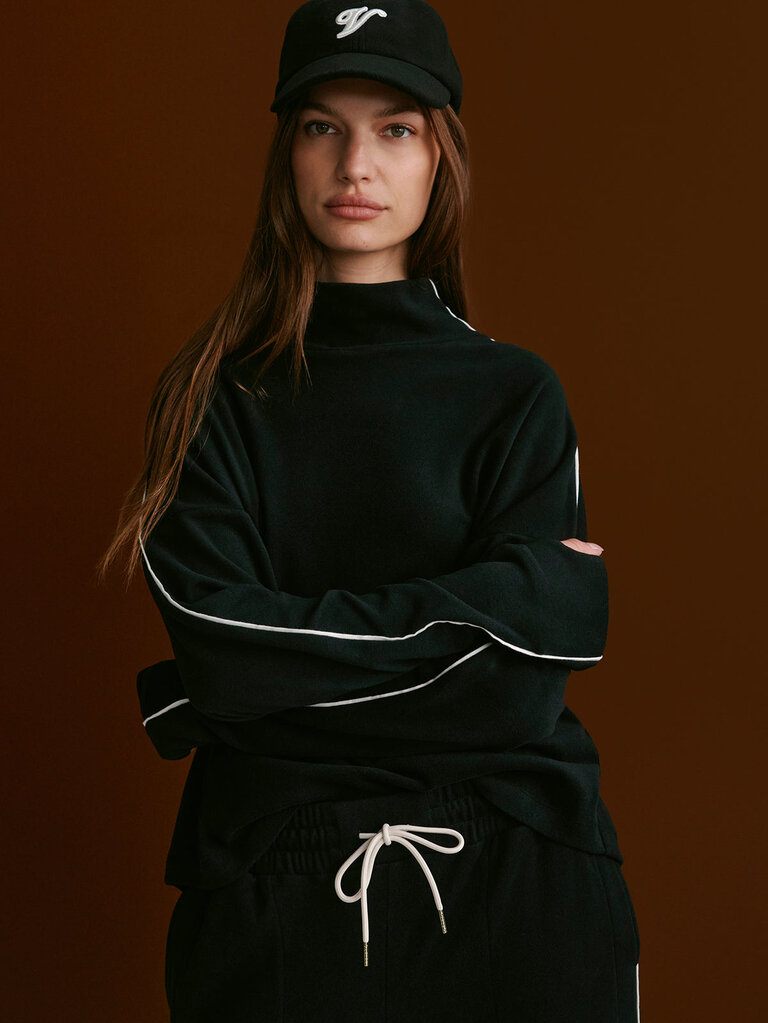 VARLEY RONA HIGH NECK MIDLAYER IN BLACK/SNOW WHITE