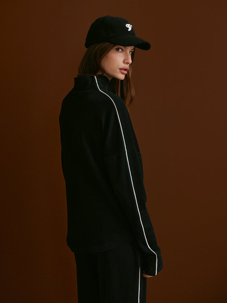 VARLEY RONA HIGH NECK MIDLAYER IN BLACK/SNOW WHITE