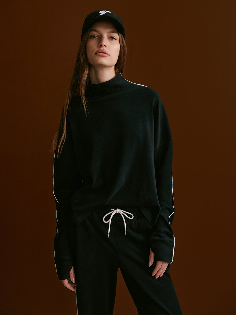 VARLEY RONA HIGH NECK MIDLAYER IN BLACK/SNOW WHITE