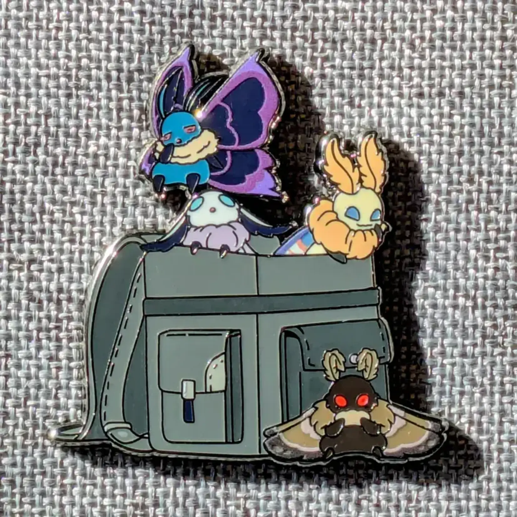 Mimic Gaming Co Enamel Pin - Bag Of Mothmen