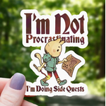 Mimic Gaming Co Sticker: Cat Doing Side Quests Funny - 3"