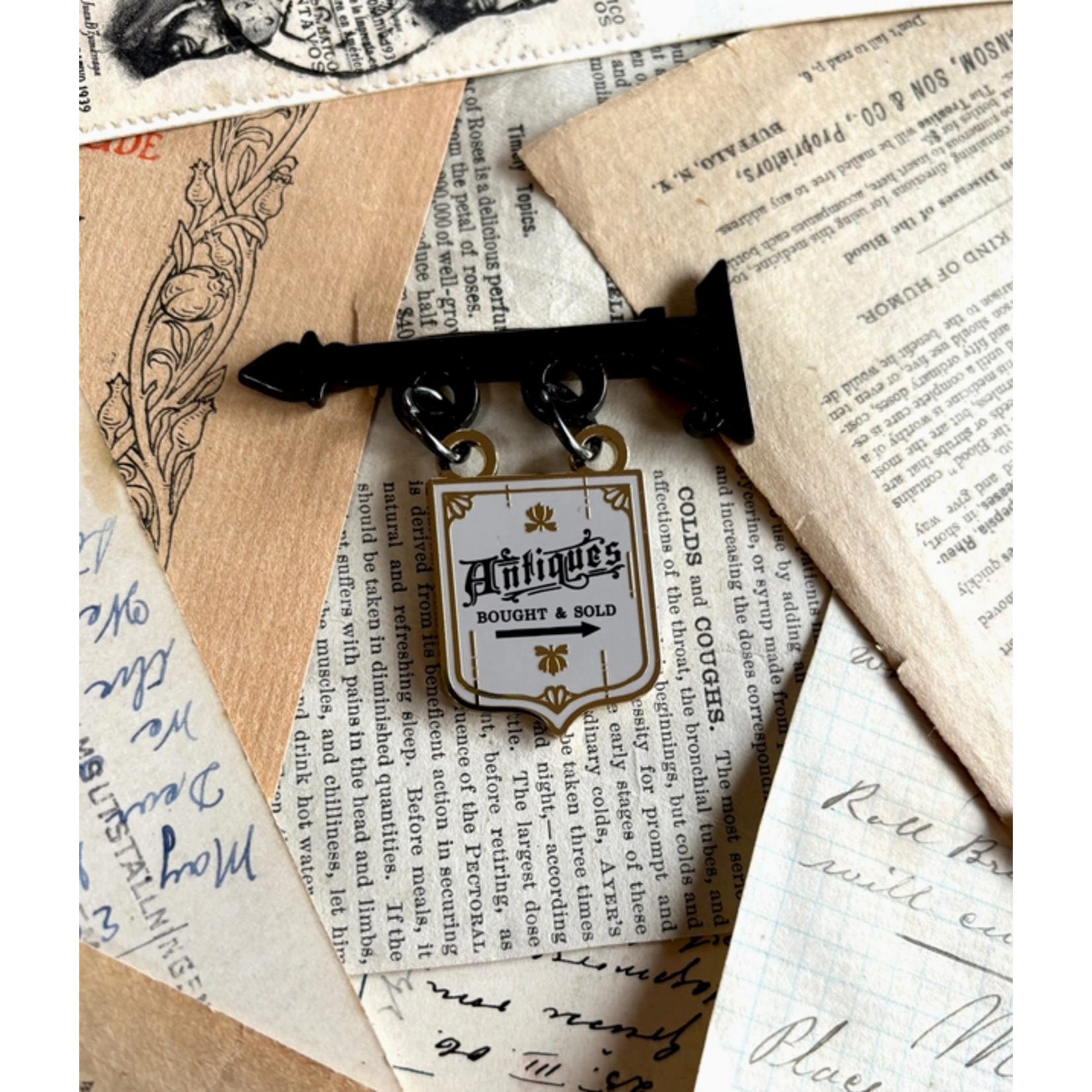 The Creeping Moon Enamel Pin - Antique Shop Sign