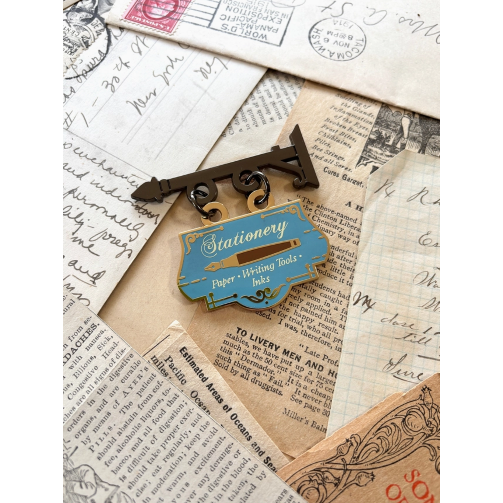 The Creeping Moon Enamel Pin - Stationery Shop Sign