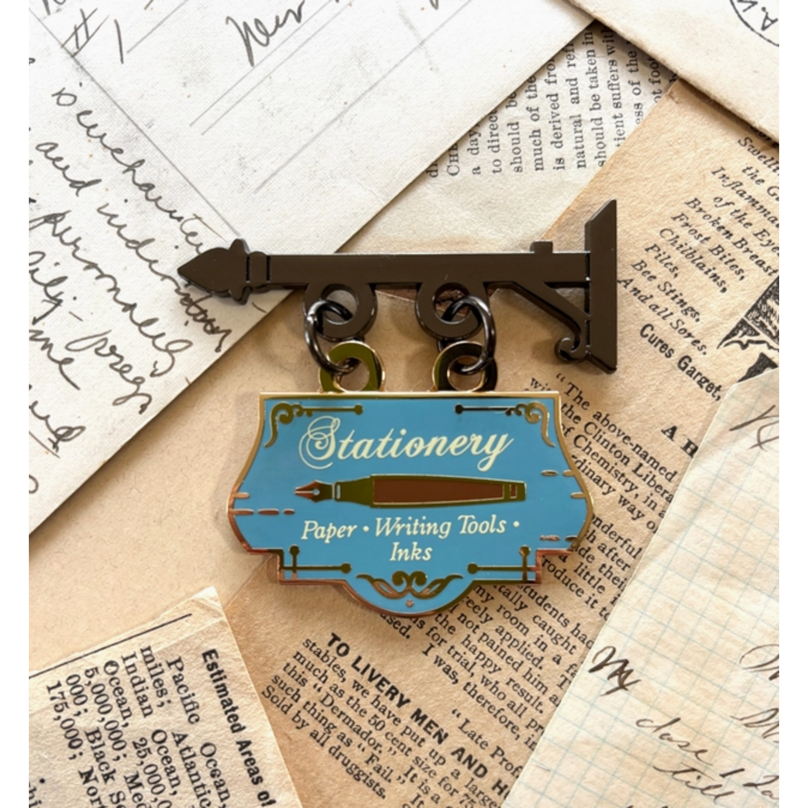 The Creeping Moon Enamel Pin - Stationery Shop Sign
